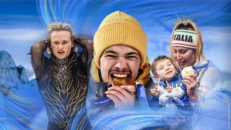 Philipp Raimund jubelt mit Goldmedaille, daneben Lindsey Vonn nach ihrem Sturz