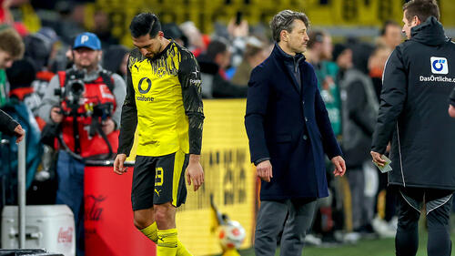 Emre Can im Trikot von Borussia Dortmund blickt fokussiert auf dem Spielfeld