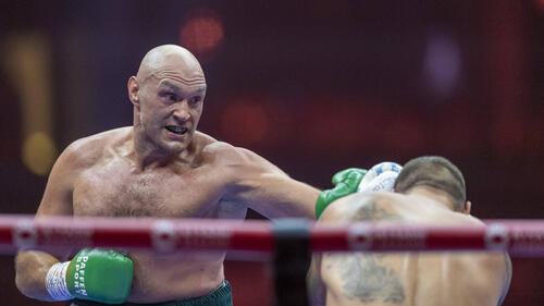 Die Schwergewichtsboxer Tyson Fury und Anthony Joshua stehen sich fiktiv im Boxring gegenüber