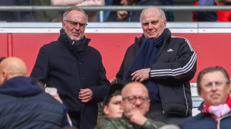 Karl-Heinz Rummenigge blickt ernst auf der Tribüne bei einem Champions-League-Spiel