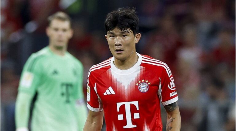 Min-jae Kim im Trikot des FC Bayern München mit fokussiertem Blick auf dem Spielfeld