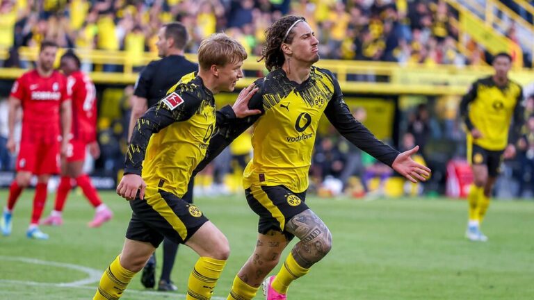 BVB-Außenverteidiger Daniel Svensson im Trikot von Borussia Dortmund in Aktion auf dem Spielfeld.