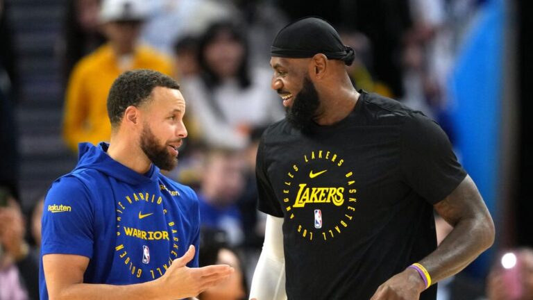 LeBron James fokussiert im Trikot der Los Angeles Lakers auf dem Basketball-Court.