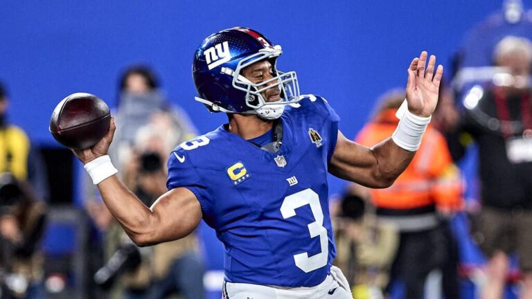 Quarterback Russell Wilson im Trikot der Seattle Seahawks auf dem Spielfeld in der NFL