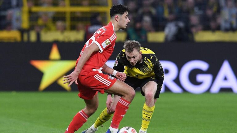 Zweikampf zwischen Spielern des FC Bayern München und Borussia Dortmund