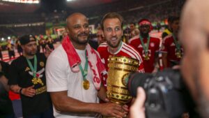 Harry Kane und Vincent Kompany im Trikot des FC Bayern München