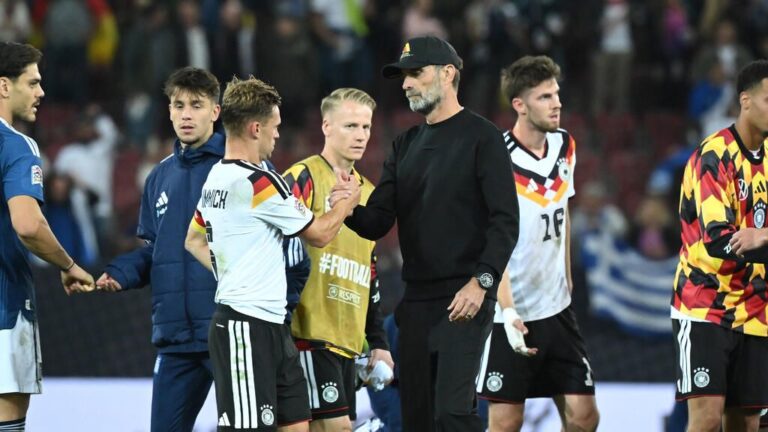 Joshua Kimmich im Trikot der deutschen Nationalmannschaft mit entschlossenem Blick auf dem Spielfeld